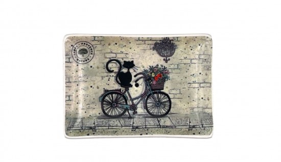 Keramieken zeepbakje van een zwarte kat op een fiets